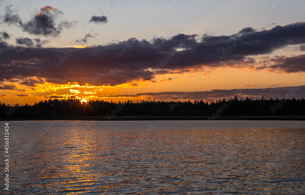 Night lake. Dark blue sky. Night landscape. Northern nature.