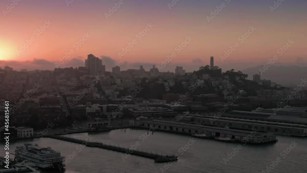 Aerial: San Francisco city skyline silhouette at sunset, USA Aerial: San Francisco city skyline silhouette at sunset, USA