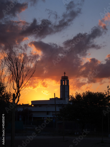 Roma, tramonto nella periferia, con le sue nuove costruzioni religiose photo