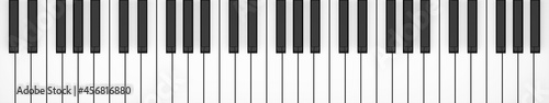 Piano or keyboard keys five octaves flat lay top view from above