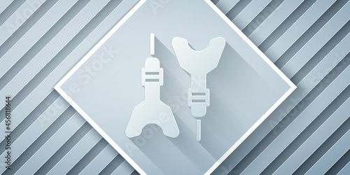 Paper cut Dart arrow icon isolated on grey background. Paper art style. Vector