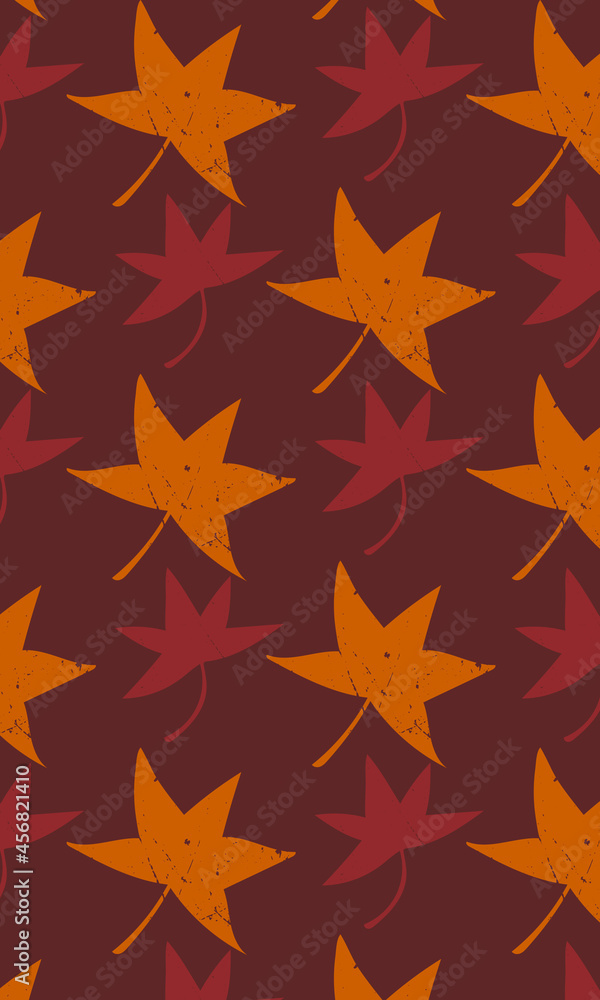 Vector pattern of autumn maple leaves. Background. Wallpaper. Retro style. Grunge. Illustration. Orange and red on a brown background. Scuff texture Vector pattern of autumn maple leaves. Background. Wallpaper. Retro style. Grunge. Illustration. Orange and red on a brown background. Scuff texture