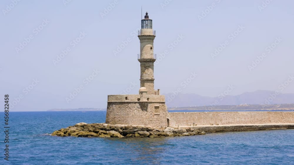 Old Venetian lighthouse at the entrance to a port in Crete (Chania) Old Venetian lighthouse at the entrance to a port in Crete (Chania)