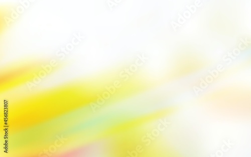 Light Green, Yellow vector blurred shine abstract template.