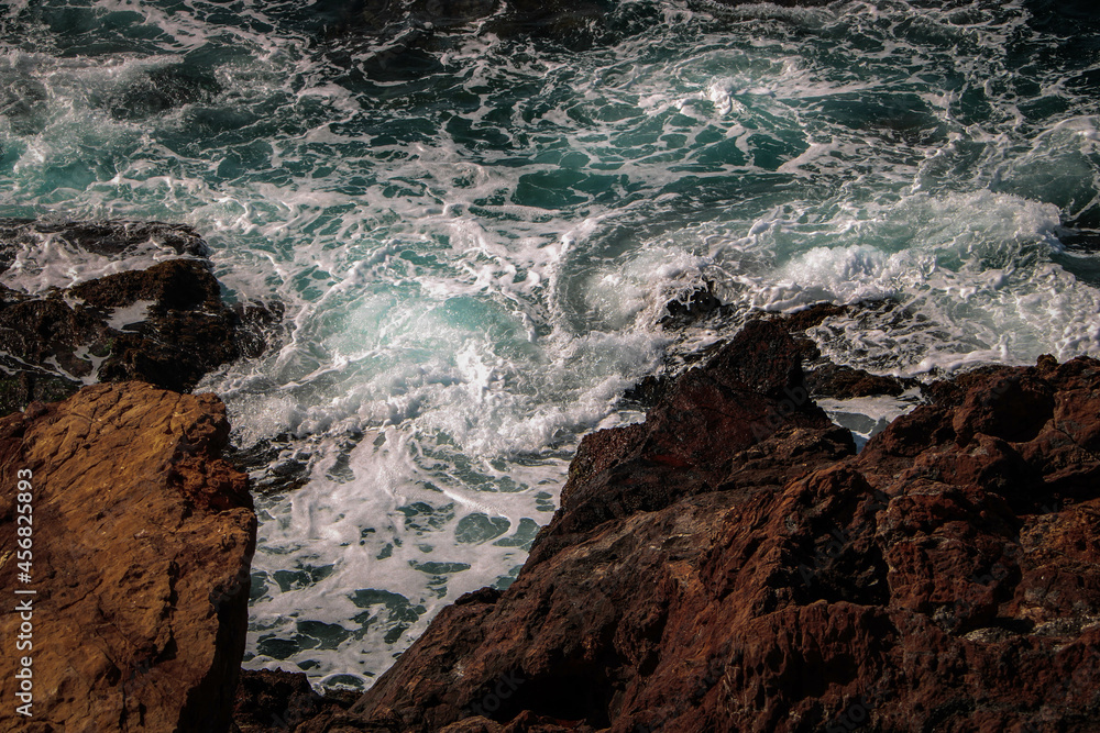 Aerial view of sea waves and fabulous rocky coast, Spain