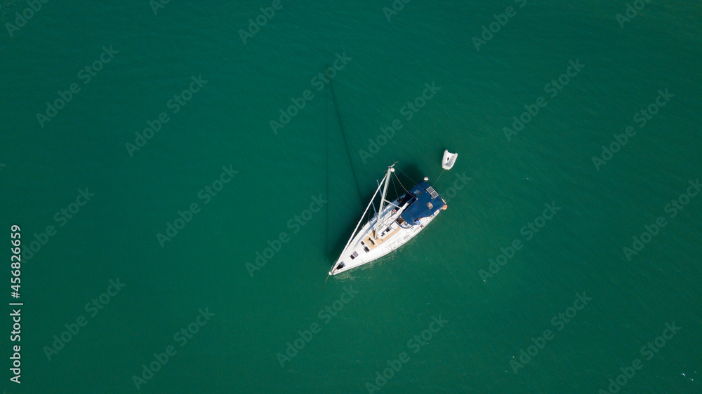 Fototapeta premium Aerial view of a sailboat in Paraty Bay, Rio de Janeiro, Brazil