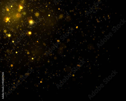 Defocused yellow light, bokeh effect and dust.