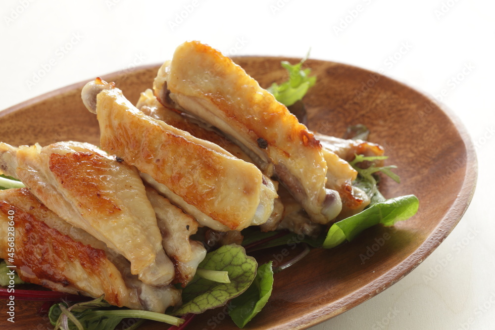 Chinese food, homemade grilled chicken on baby leaves for comfort food