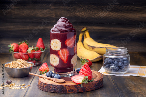 Acai cup with strawberry and banana. photo