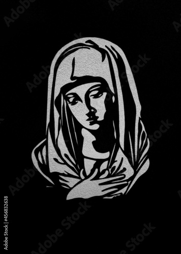 a marble engraving representing the Virgin Mary in the Orthodox cemetery in Reghin city - Romania