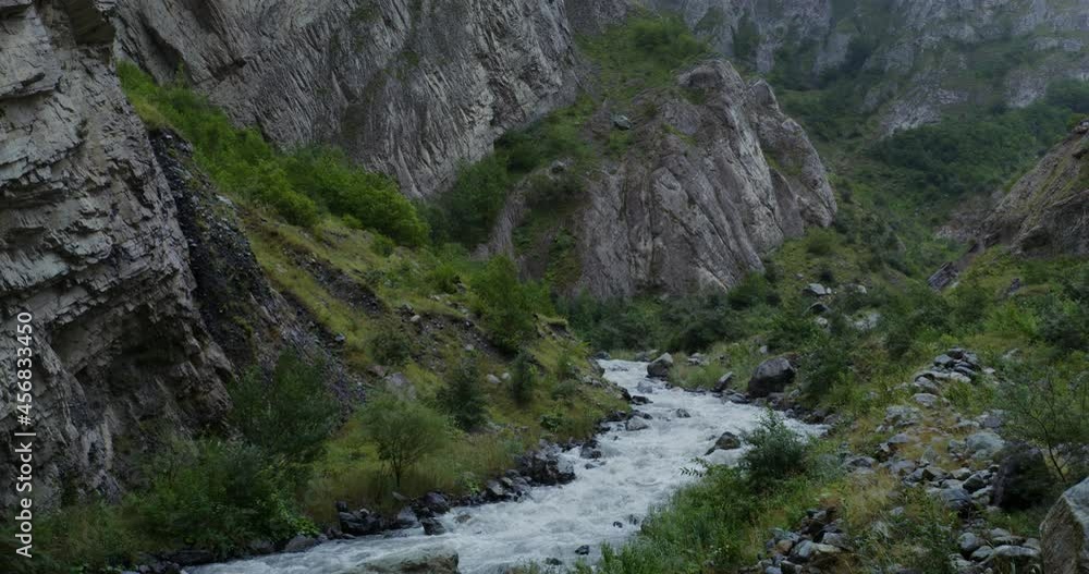 Mountain river, seething with strong stream among the rocks Mountain river, seething with strong stream among the rocks