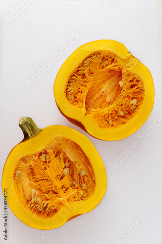 Fresh cut pumpkin isolated on white background.