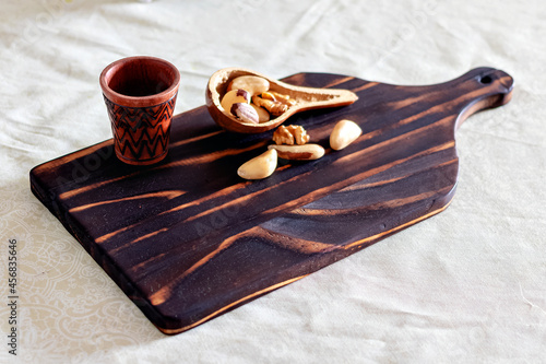 brazil nuts in a cutting board. shou sugi ban cutting board