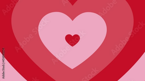 Red Hypnotic heart shaped tunnel. Rainbow retro wallpapper psychedelic 70's 4k seamless looped animated background.