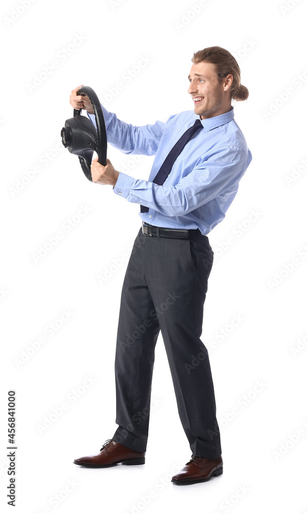 Young man with steering wheel on white background Young man with steering wheel on white background