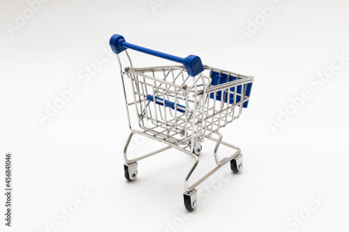 shopping cart with blue handle isolated on a white background