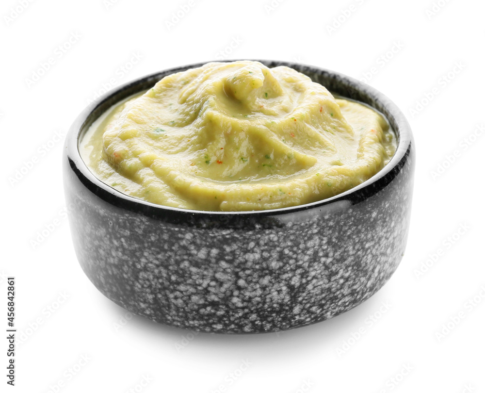 Bowl with tasty baba ghanoush hummus on white background Bowl with tasty baba ghanoush hummus on white background