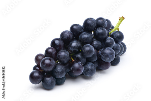Black grape isolated on white background.