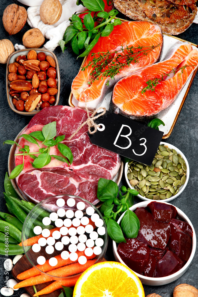 Food high in vitamin B3 on dark background. Food high in vitamin B3 on dark background.