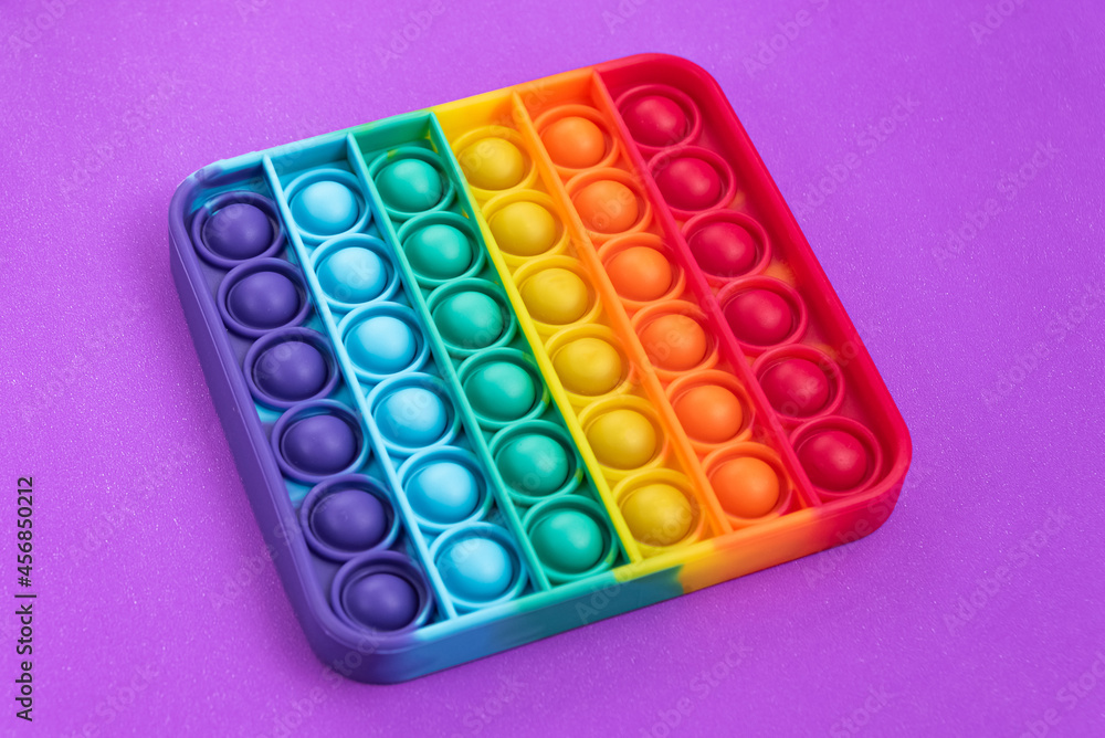 Fidget pop it toy rainbow color - antistress, fun and educational Fidget pop it toy rainbow color - antistress, fun and educational