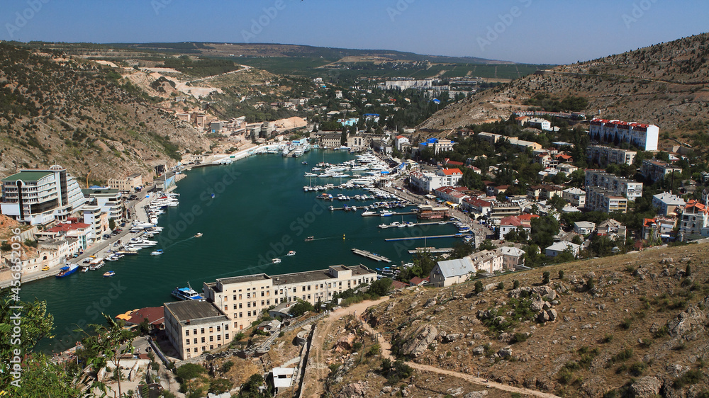 Balaklava bay, Bella Chiava, Beautiful harbor in Crimea. Panorama of the entrance to the Balaklava Bay. Morning. View from the mountain Krepostnaya. Most of the Crimean yachts take refuge in the