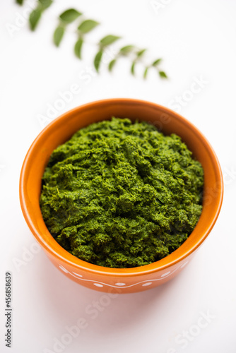 curry leaves or kadi patta chutney in a bowl