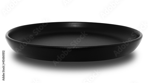Black circle ceramics plate isolated on white background.
