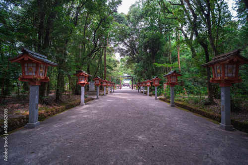 The path leading to the temple is decorated with lanterns on the right and left.