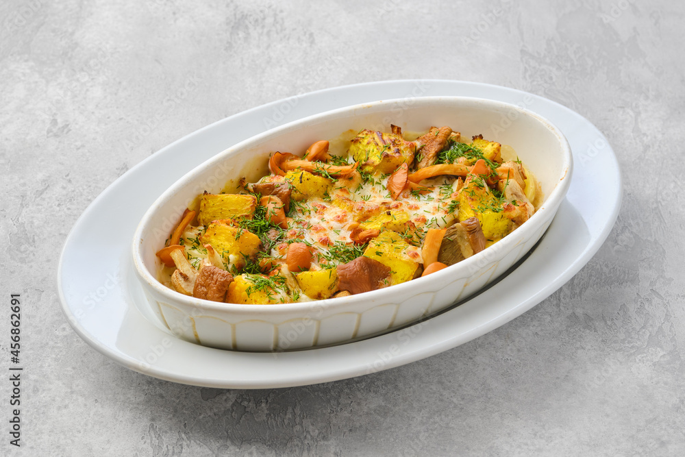 Casserole with honey agarics, pumpkin and potatoes Casserole with honey agarics, pumpkin and potatoes