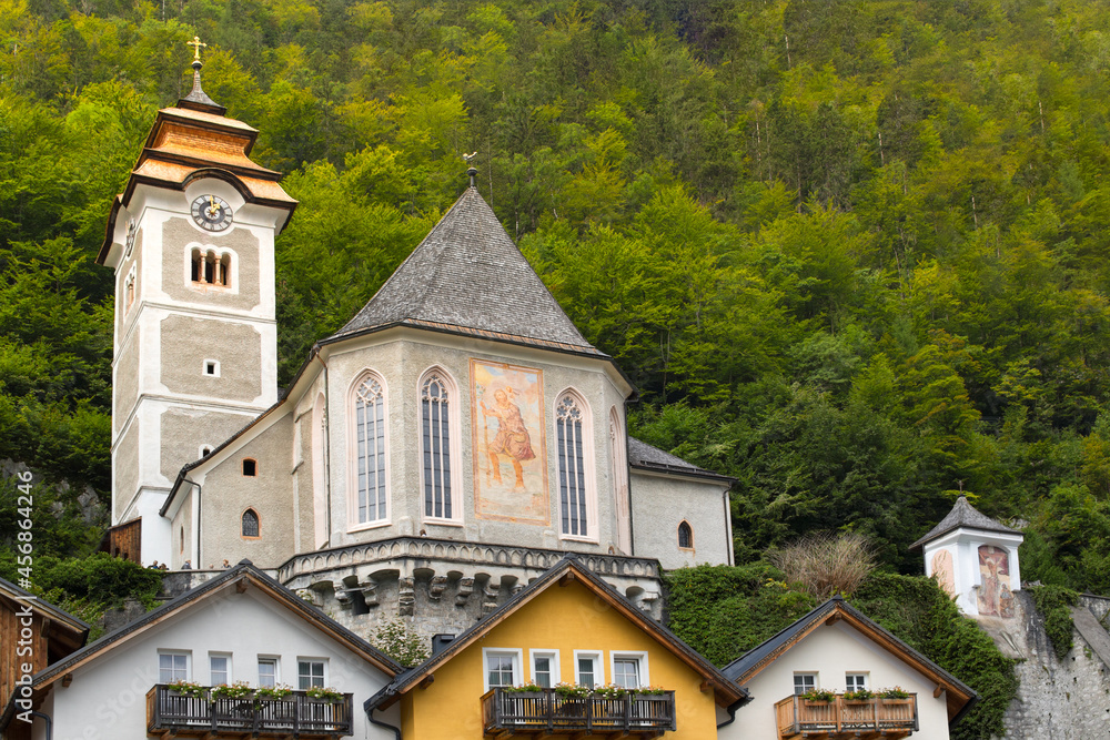 Old church tower, roof of houses in the village of Hallstatt, Salzkammergut, Austria
