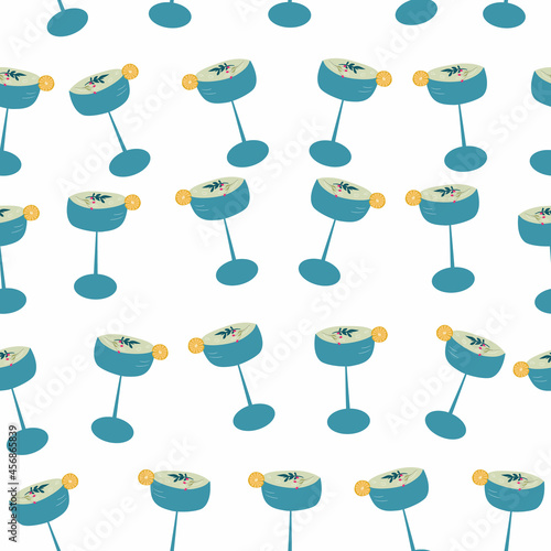 Seamless pattern from glasses of alcoholic cocktail with a slice of orange. Vector illustration 