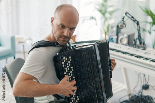Картината върху платно Professional musician playing the accordion