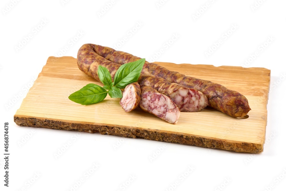 Traditioanal air dried sausage, isolated on white background.