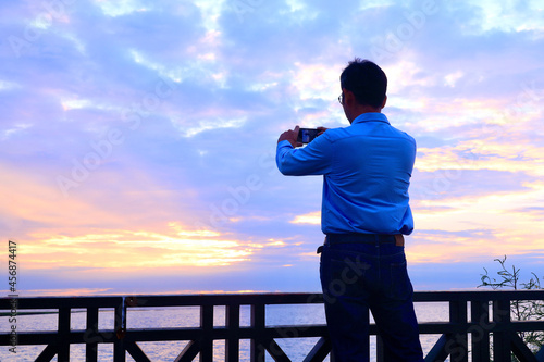 person watching sunset