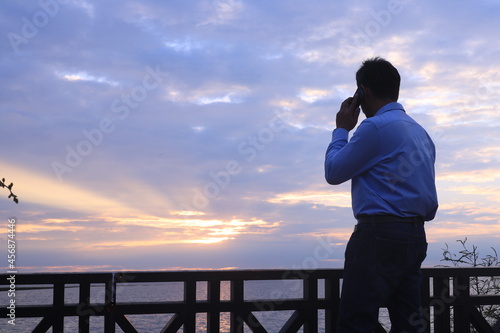 person watching sunset