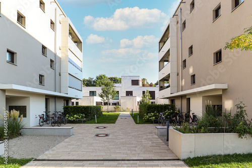 Cityscape of a residential area with modern apartment buildings, new green urban landscape in the city