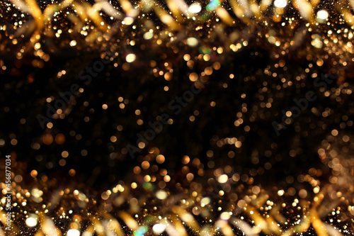 beautiful shiny gold background on a dark background