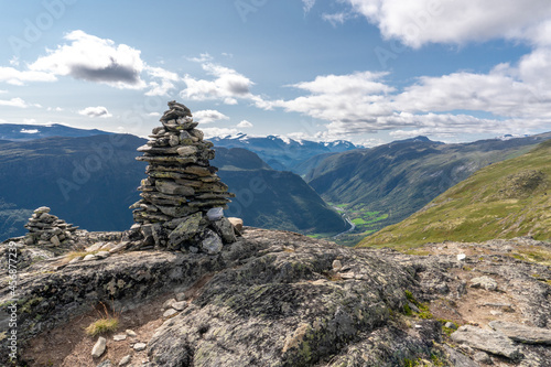 Rock tower, orientation point on the top of the Lomseggen peak in Lom, Norway. Summer. © Lukasz Machowczyk