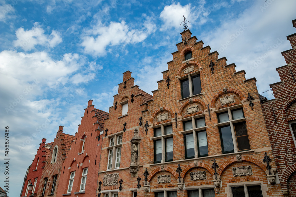Beautiful triangular fronts of buildings, street view, Bruges, Belgium