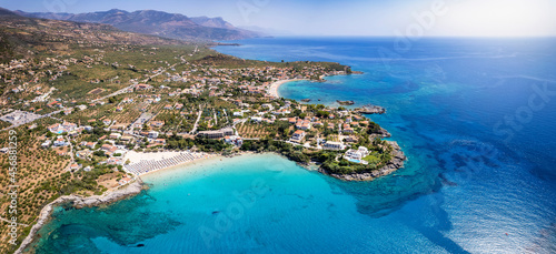 Panoramic aerial view of the beaches of Kalogria and Stoupa, Messenia, Greece, with turquoise shining sea during summer time