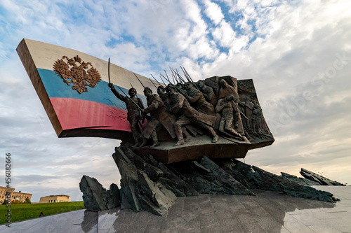 Monument to the Heroes of the First World War on Poklonnaya Hill in Victory Park in Moscow against the background of a blue sky with beautiful white clouds.