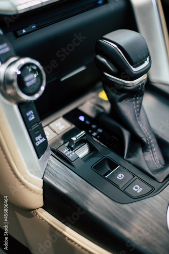 manual gearbox in car, test drive of new automobile, closeup © Hanna