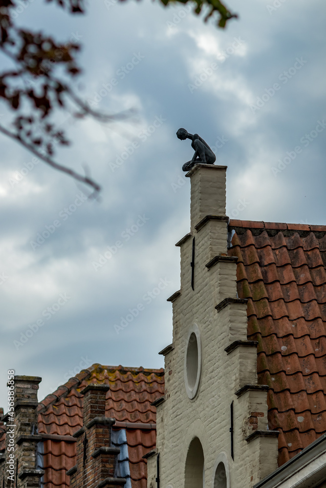 Roof cast black iron decoration, street view, Bruges, Belgium