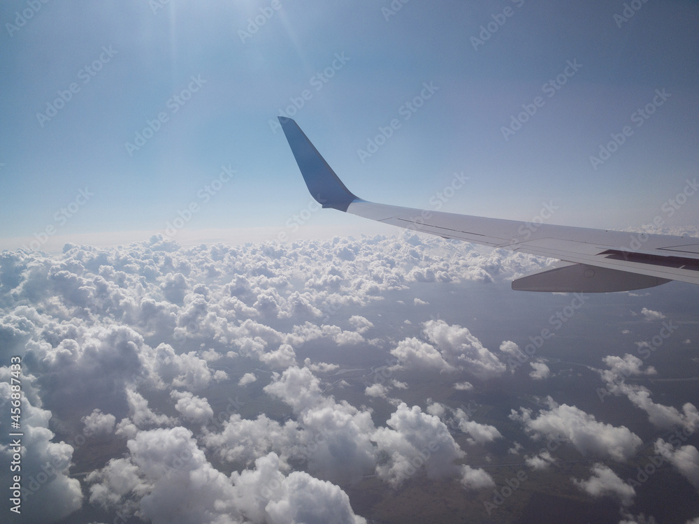 Fluffy clouds in the heaven, view from the aircraft Fluffy clouds in the heaven, view from the aircraft