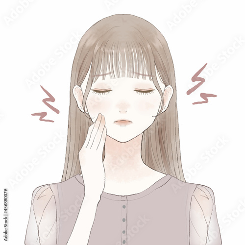 虫歯・口内炎に悩まされる女性