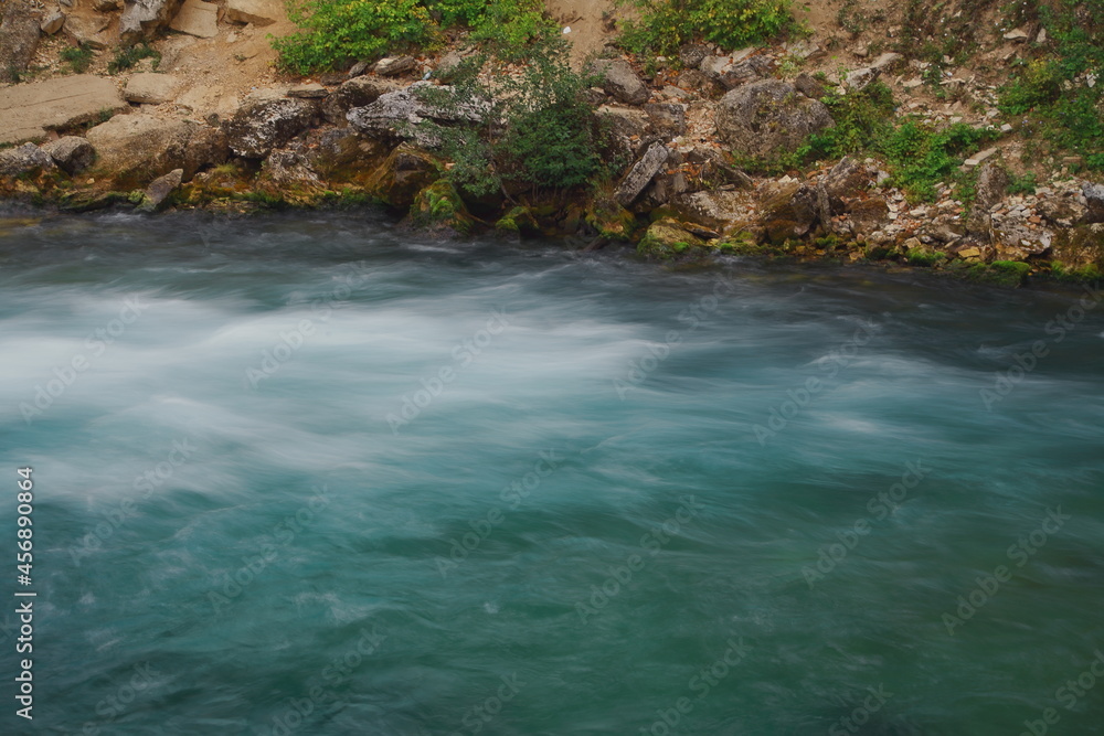 A beautiful blue big lake. Milky-blue water. Blue sky with beautiful clouds. park. a river in the forest. landscape
A beautiful blue big lake. Milky-blue water. Blue sky with beautiful clouds. park. a river in the forest. landscape