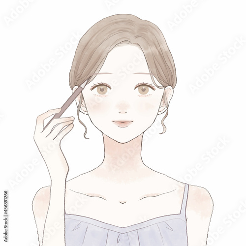 アイブロウをする女性