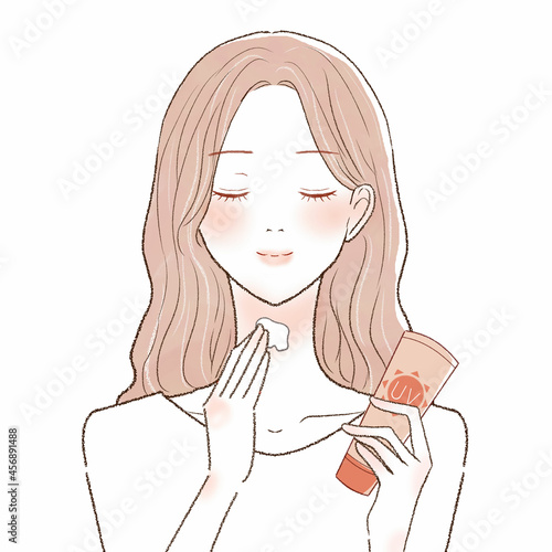 日焼け止めクリームを首に塗る女性