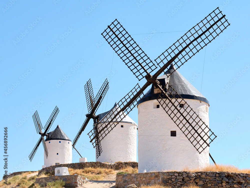 The windmills of Consuegra, located on Colle Calderico, on a sunny day in summer. The windmills of Consuegra, located on Colle Calderico, on a sunny day in summer.