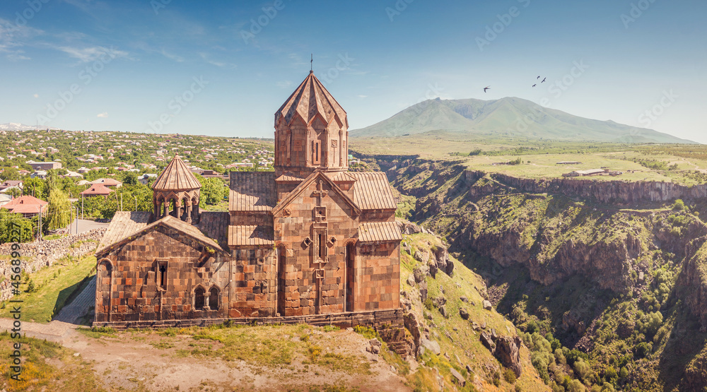 Aerial view of Hovhannavank monastery and church on the edge of a scenic Kasakh gorge and canyon. Travel and religious destinations and attractions in Armenia